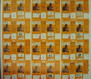 Eighteen little Wheaties boxes with Michael Jordan on an uncut sheet.