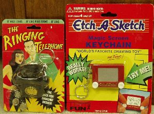 Etch-A-Sketch Key Chain with Magic Screen and the other is a Ringing Telephone