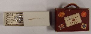 Tiny, little suitcase with a surprise gift inside