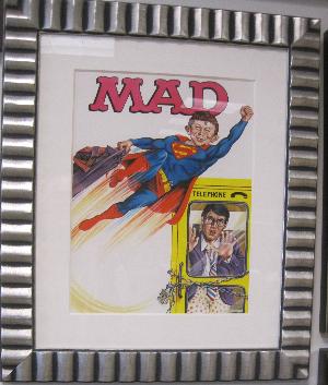 Alfred E. Neuman steals Clark Kent's pants.